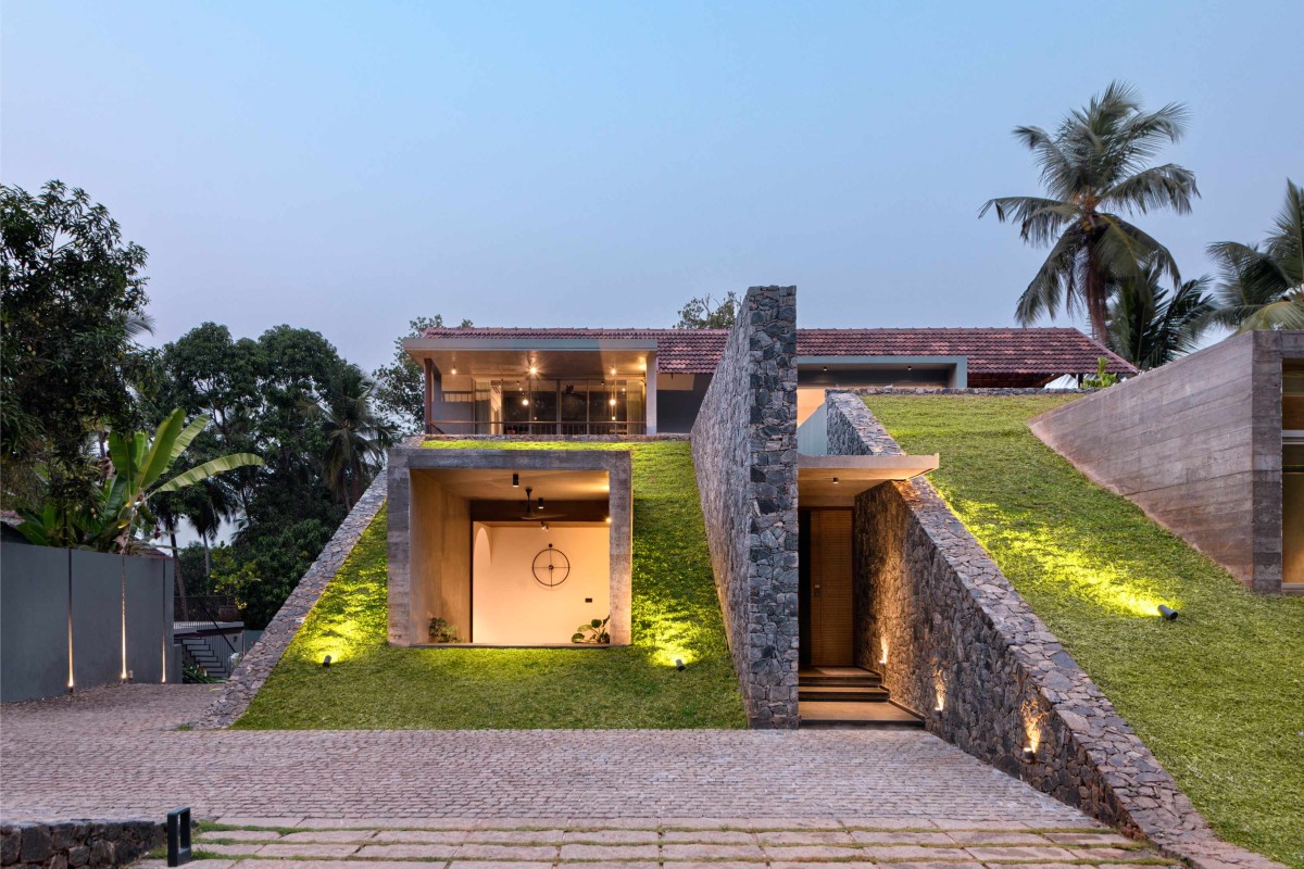 Dusk light exterior view of The Hidden House by Aslam Sham Architects