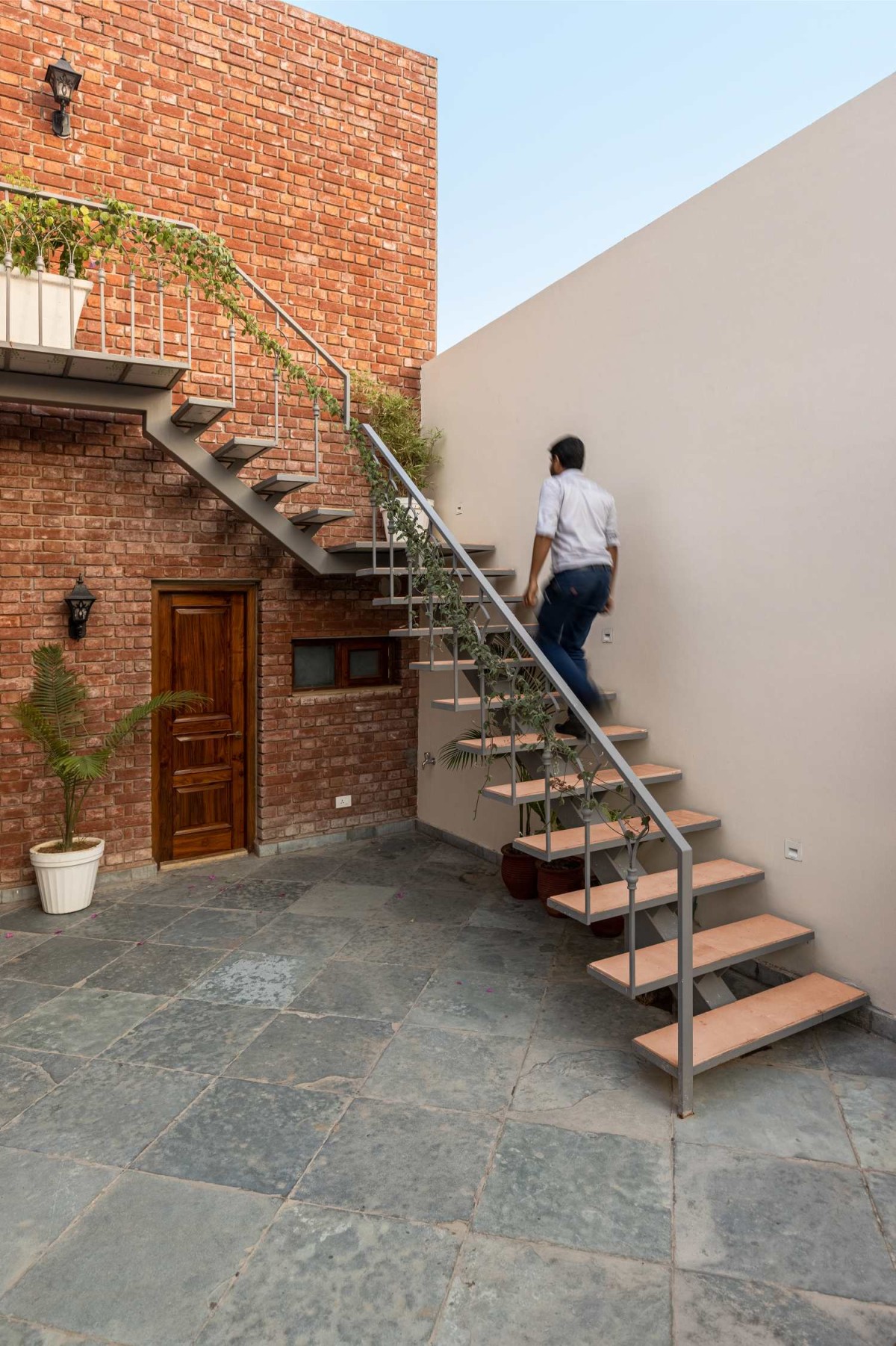 External staircase of The Tapered House by Studio Mohenjodaro