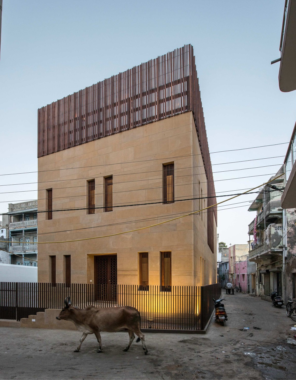 Dusk light exterior view of Mandvi House by SPASM Design Architects