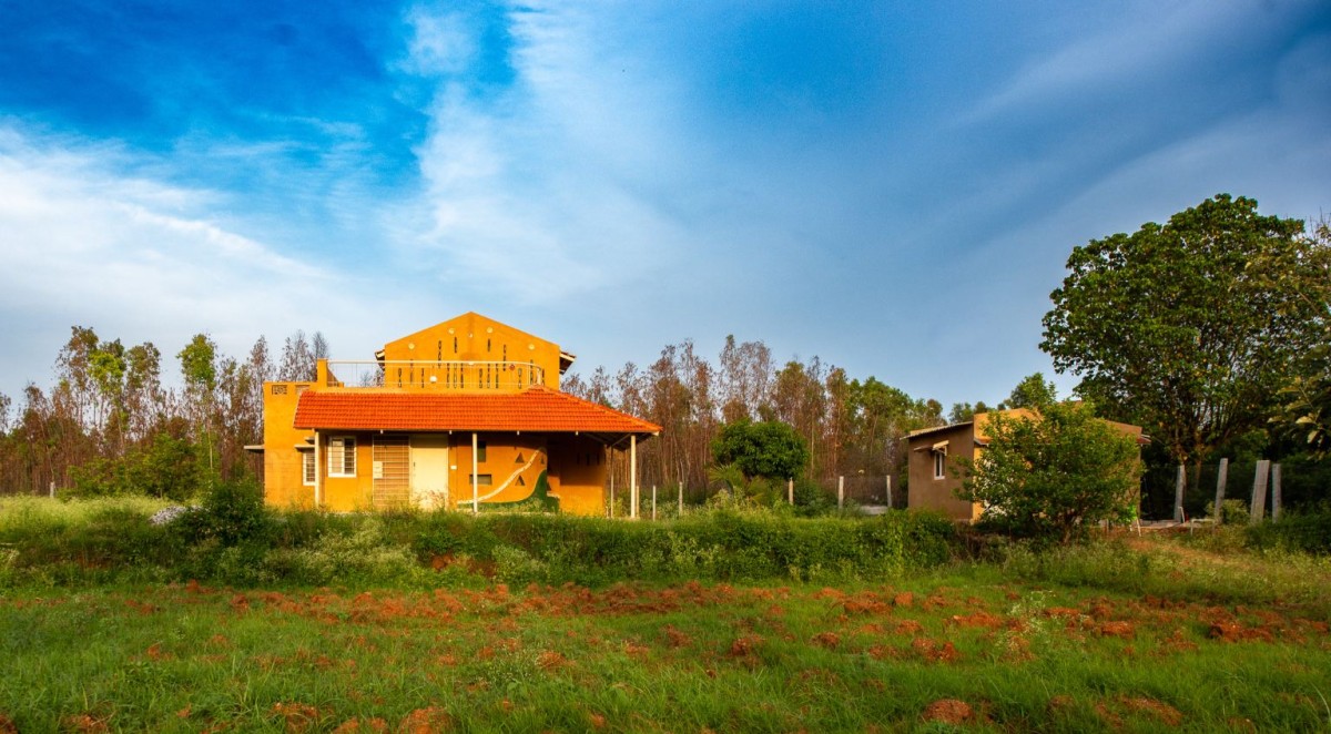 Exterior view of Composite Earth Farmhouse by Studio Verge