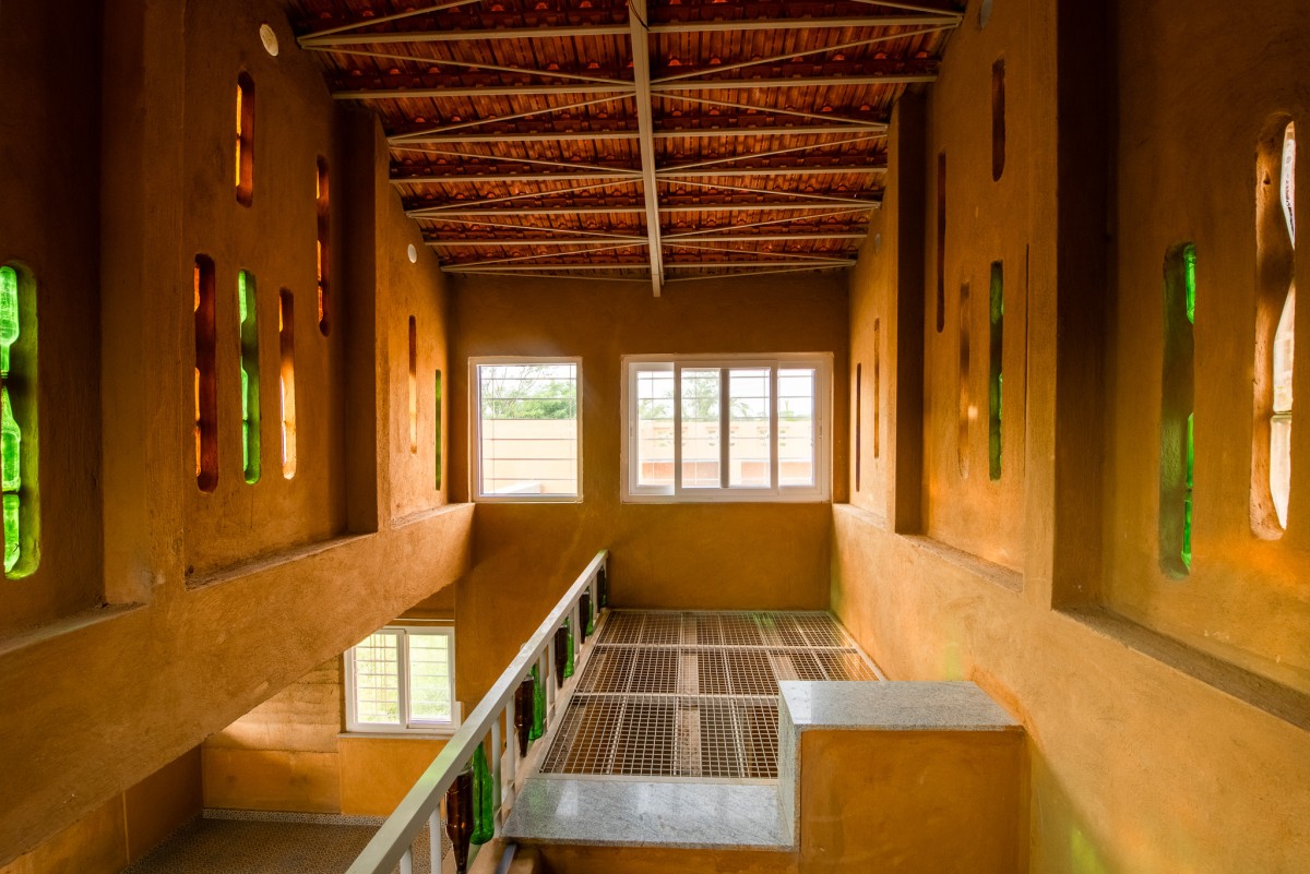 Loft area of Composite Earth Farmhouse by Studio Verge