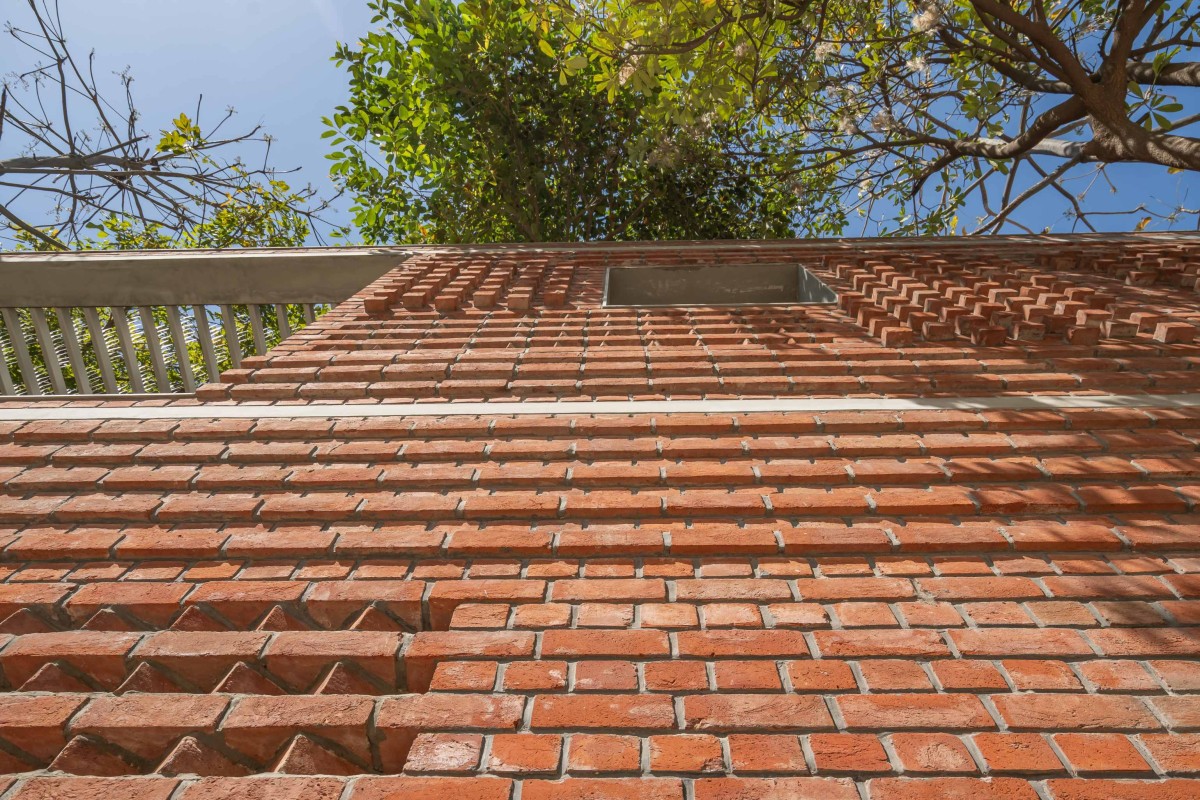 Detailed shot of exterior wall of The Maze House by MISA Architects