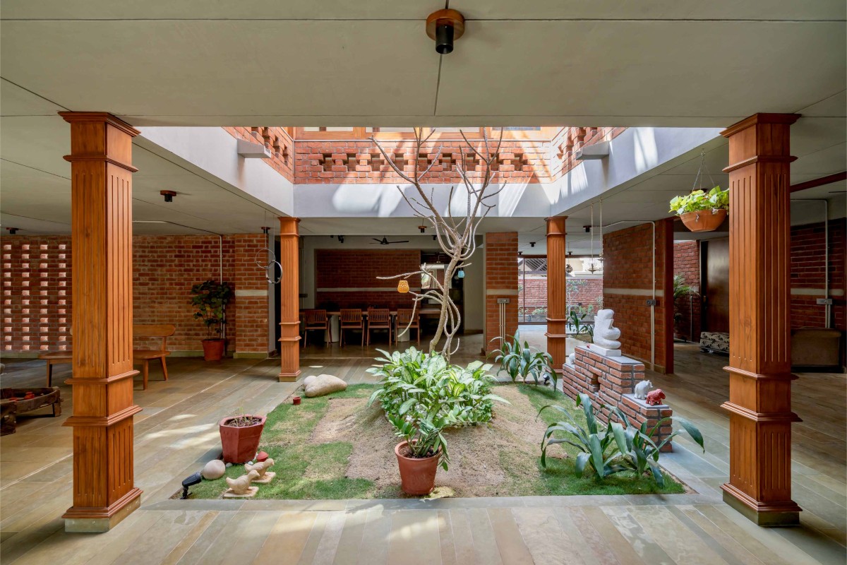 Open-to-sky courtyard of The Maze House by MISA Architects