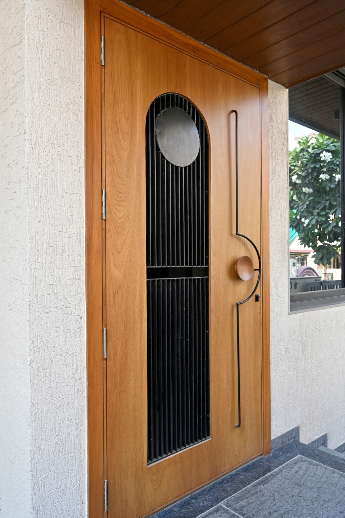 Main door of Humble Abode by Woodpeckers Studio