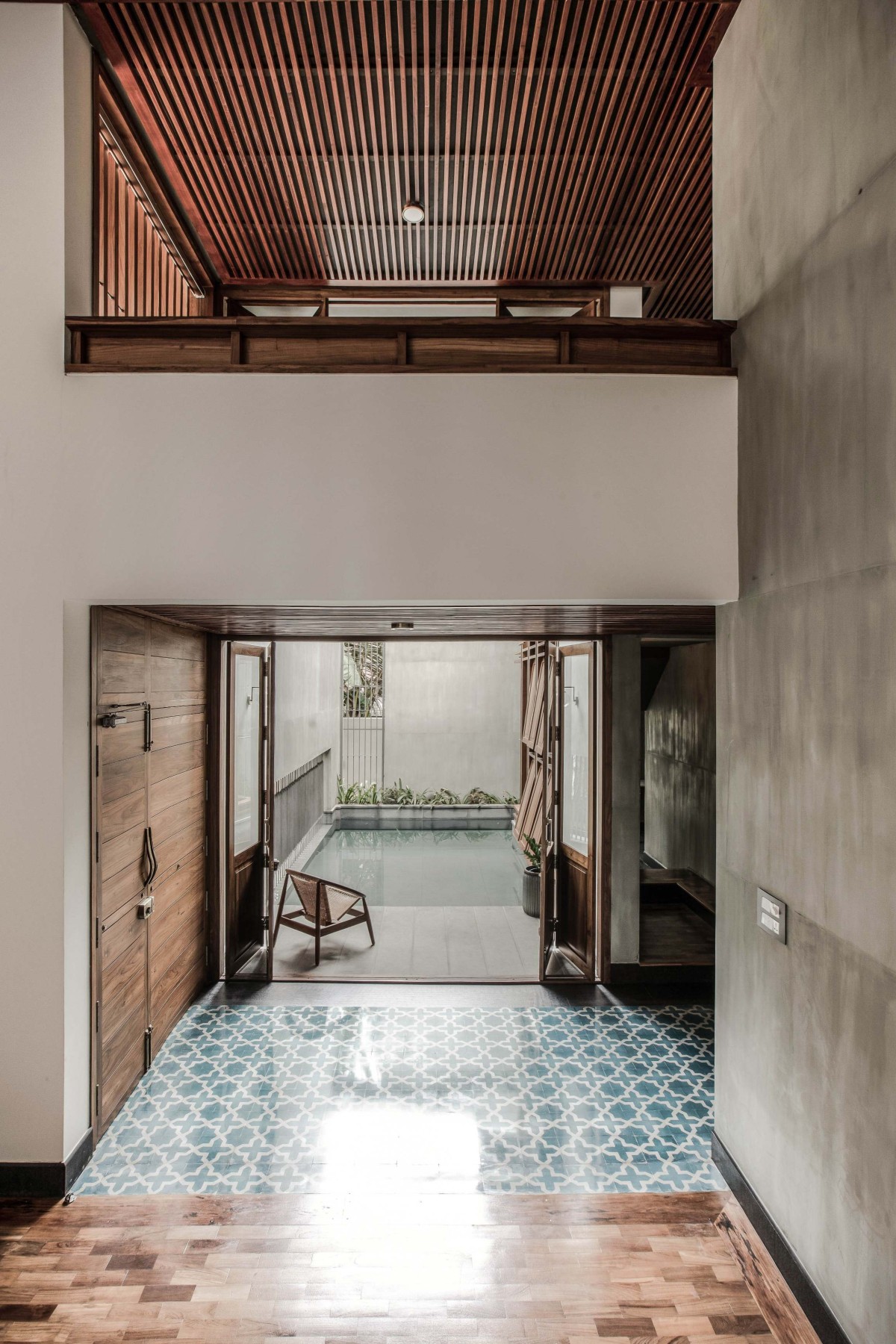 Passage to waterbody of Alankar Residence by Roy Antony Architects
