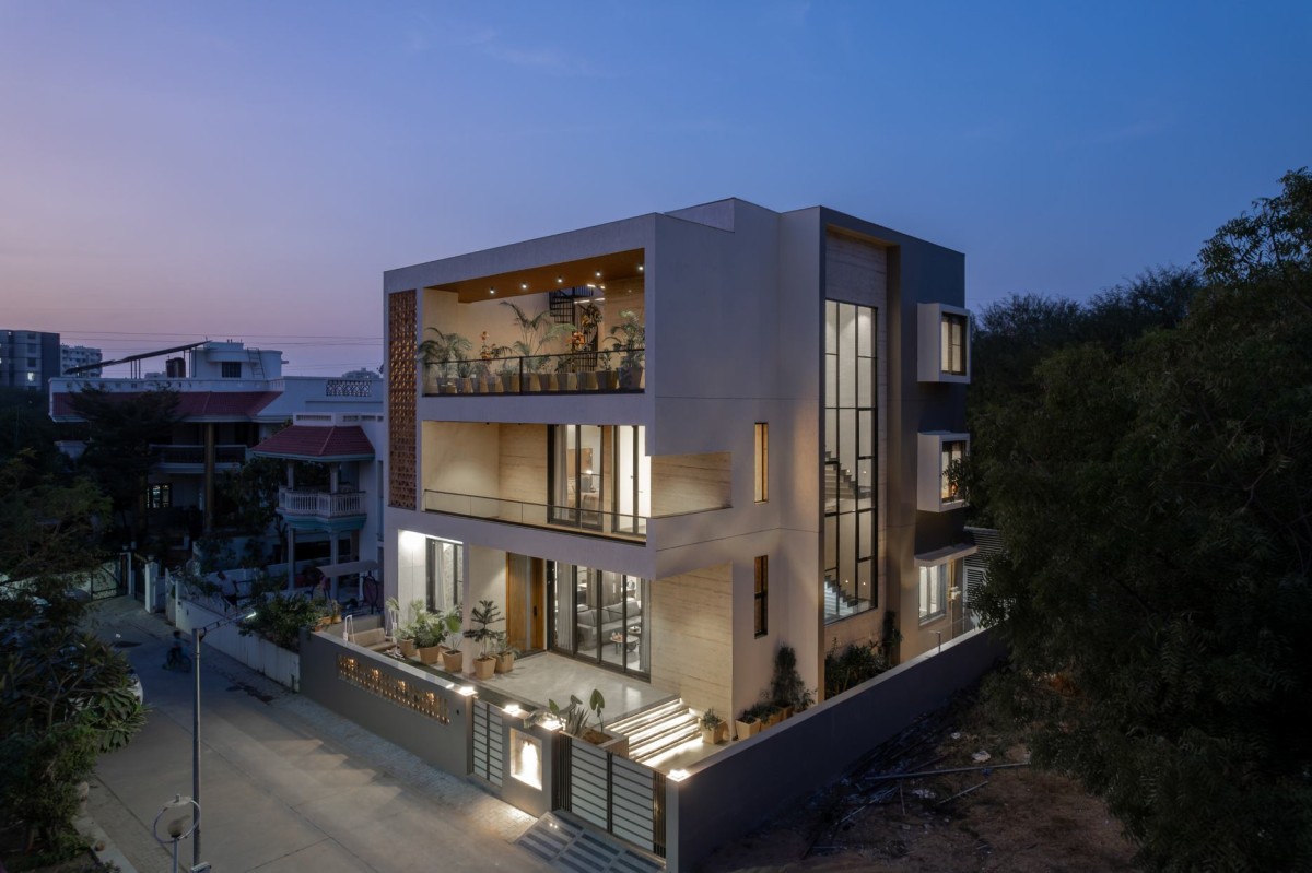 Dusk light exterior view of Frame House by UrbanNest Design Studio