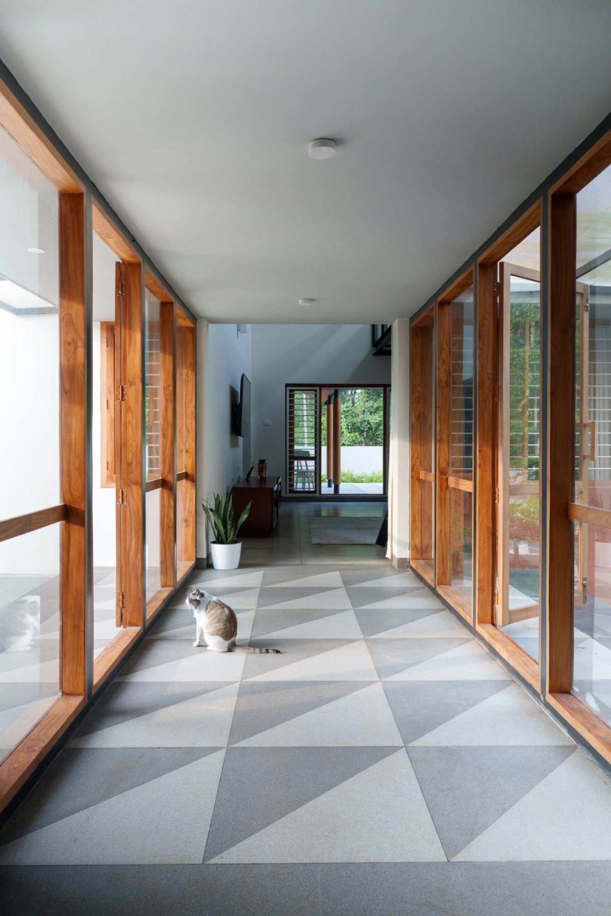 Corridor of Inside-Out Residence by The Design Room