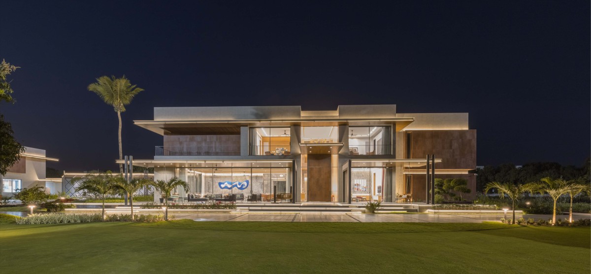 Dusk light exterior view of right house of Narola Villa by Essteam Design Services LLP