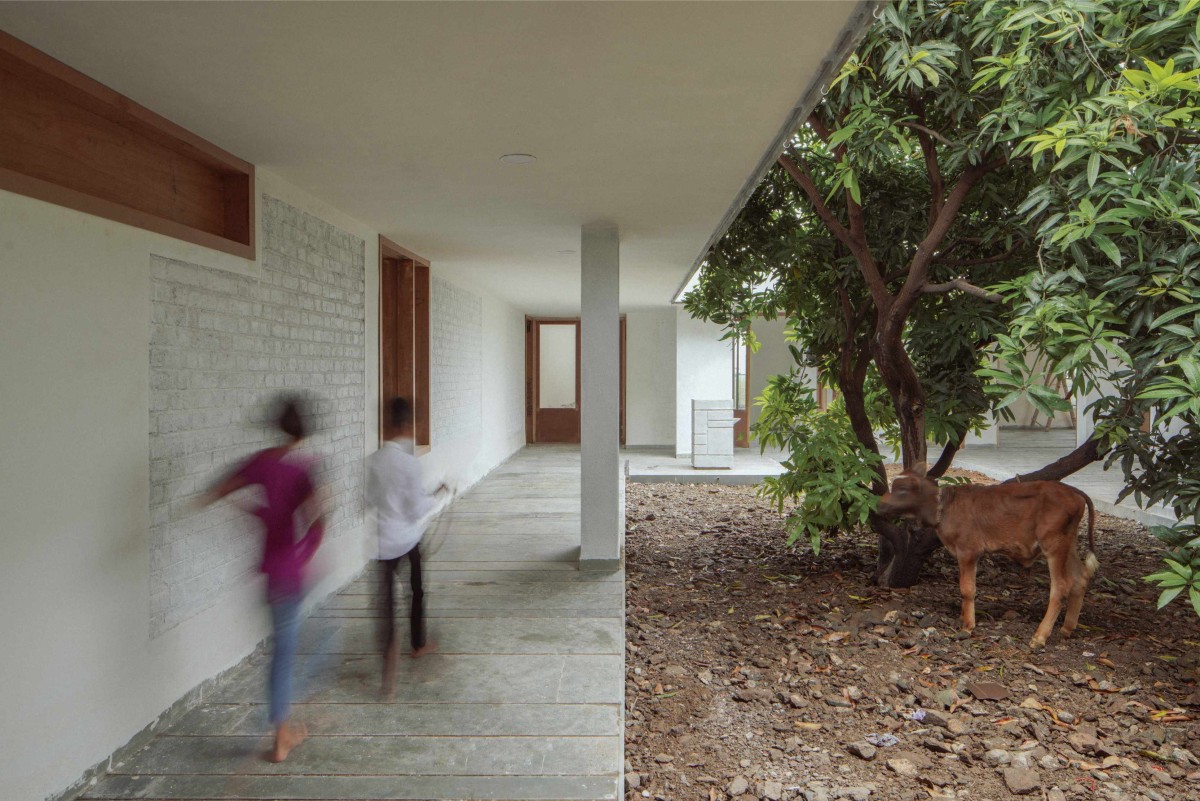 Courtyard of House of Tranquil Rooms by Craft Narrative