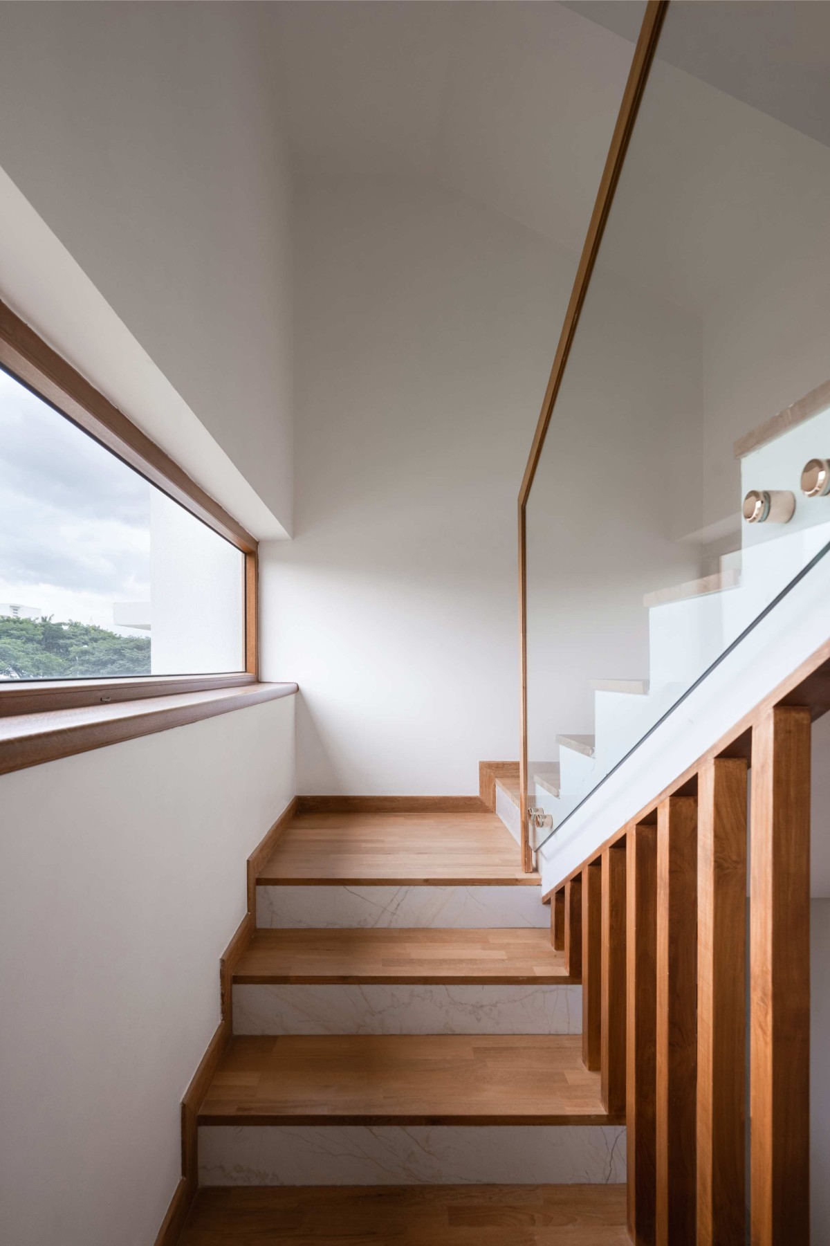 The minimalistic balustrade design enhances the delicate aesthetic look