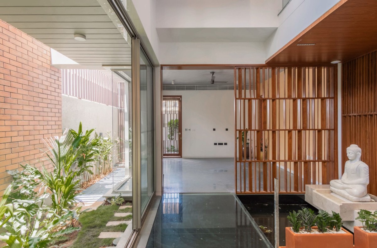 Passage to formal living room of One Ground Home by Shanmugam Associates