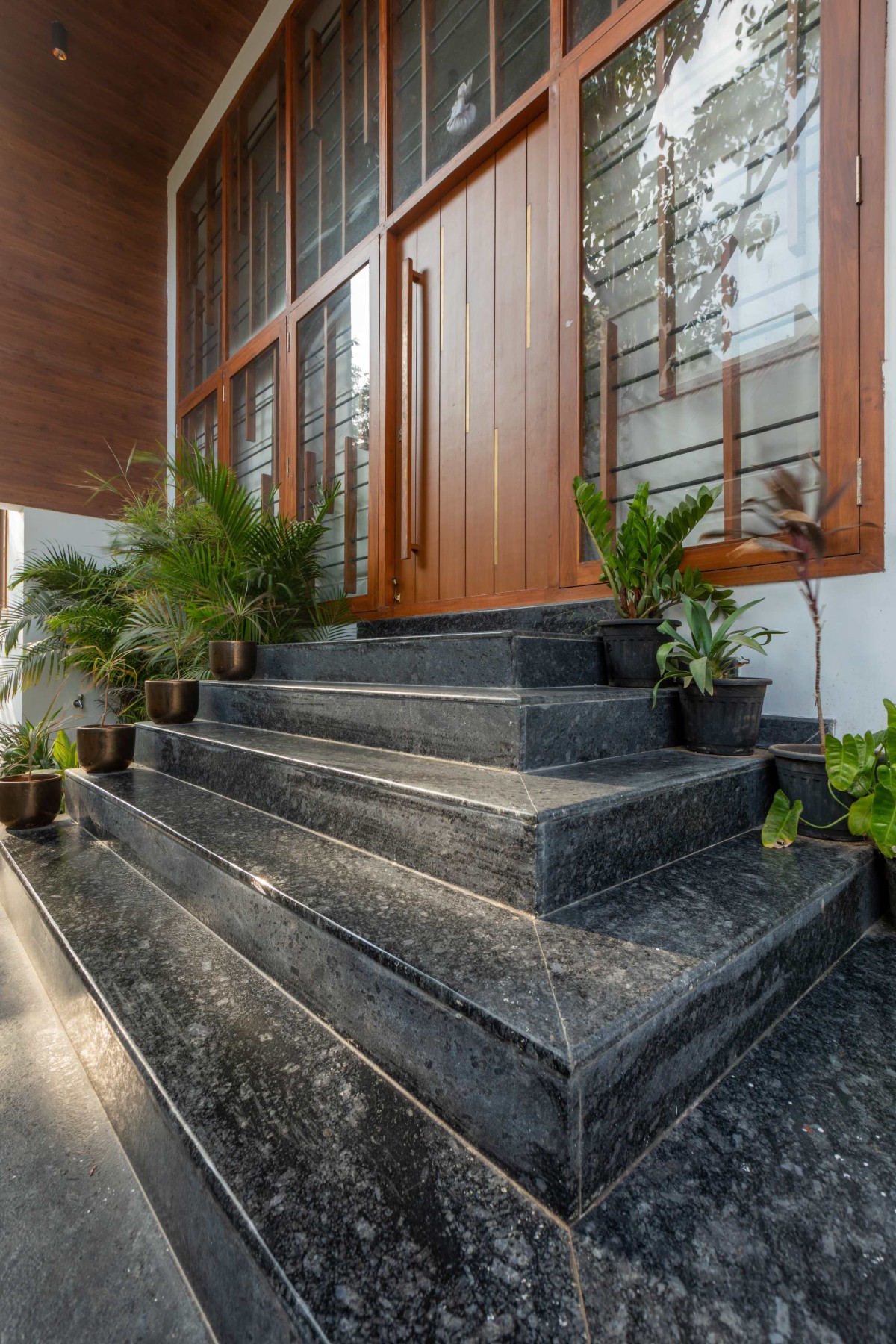 Entrance of Level House by Ainthinai Projects