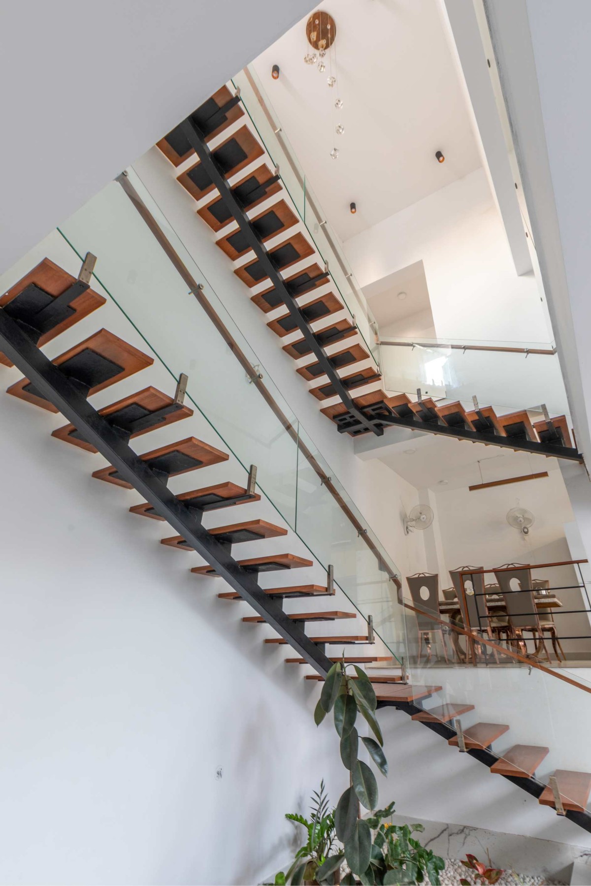 Staircase of Level House by Ainthinai Projects