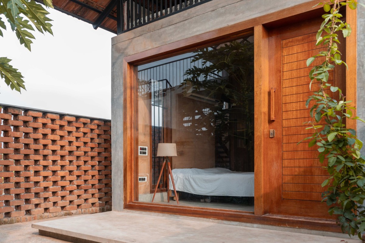 Entry to bedroom of SITH Villa by Aagaram Architects