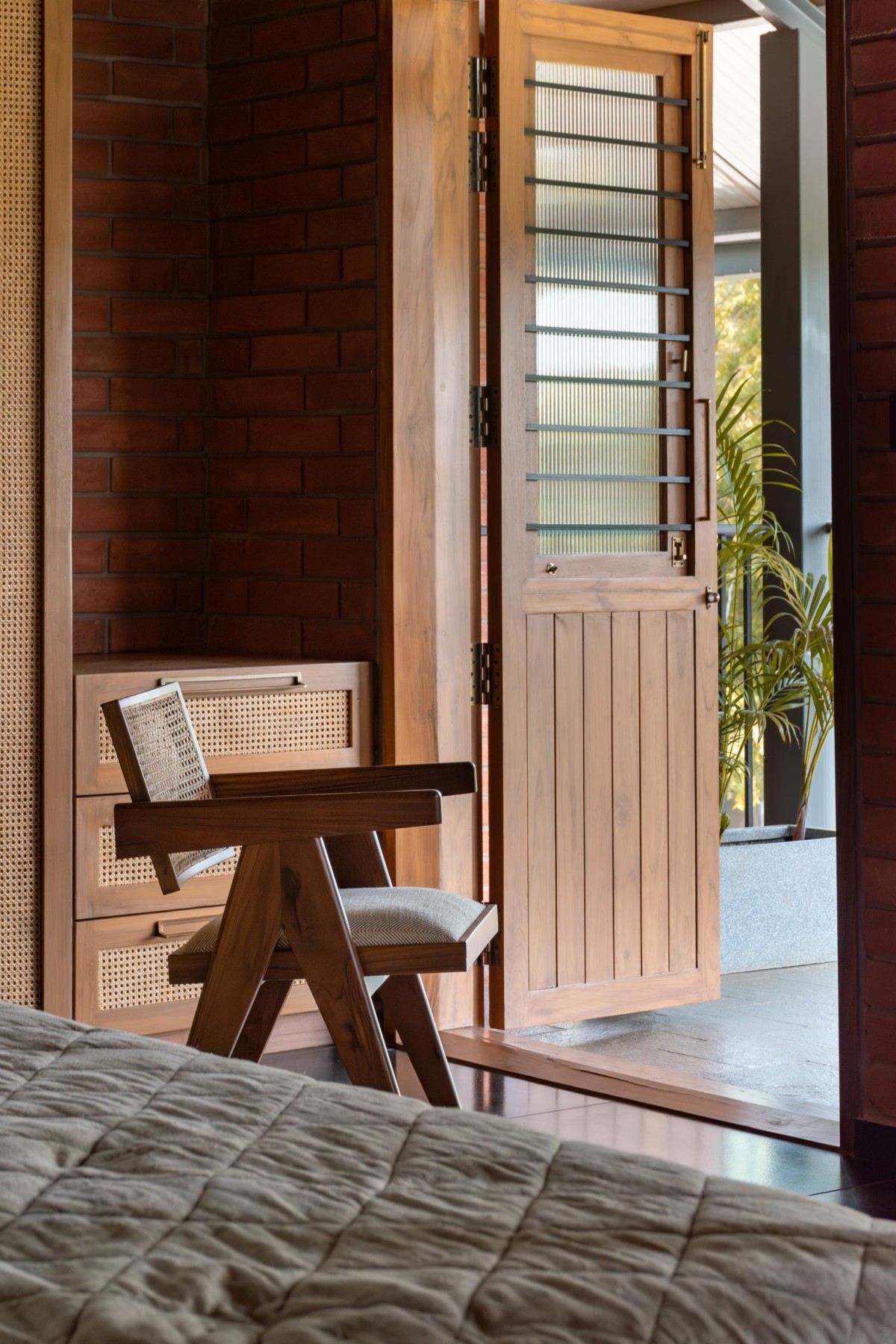 Bedroom of Jalmanjar Farmhouse by Put Your Hands Together - BioArchitects