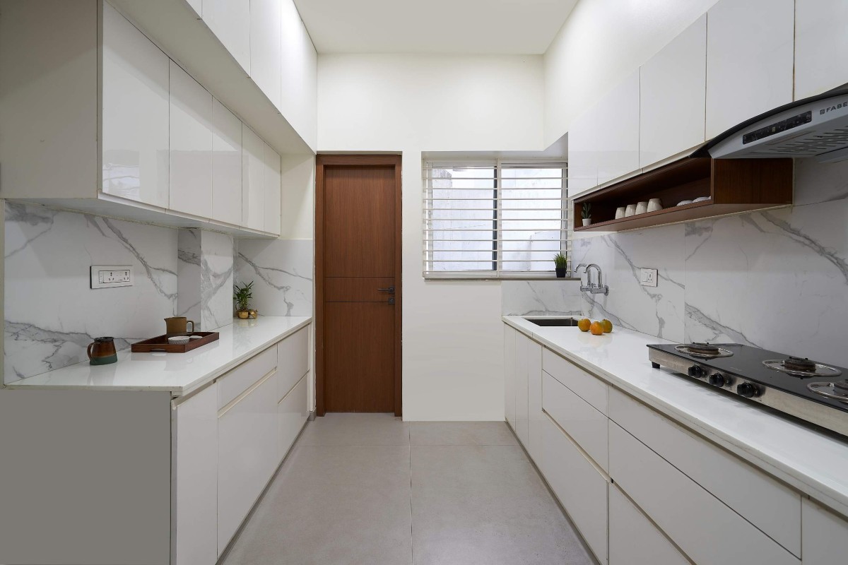 Kitchen of Tranquil Court House by Studio Habitect