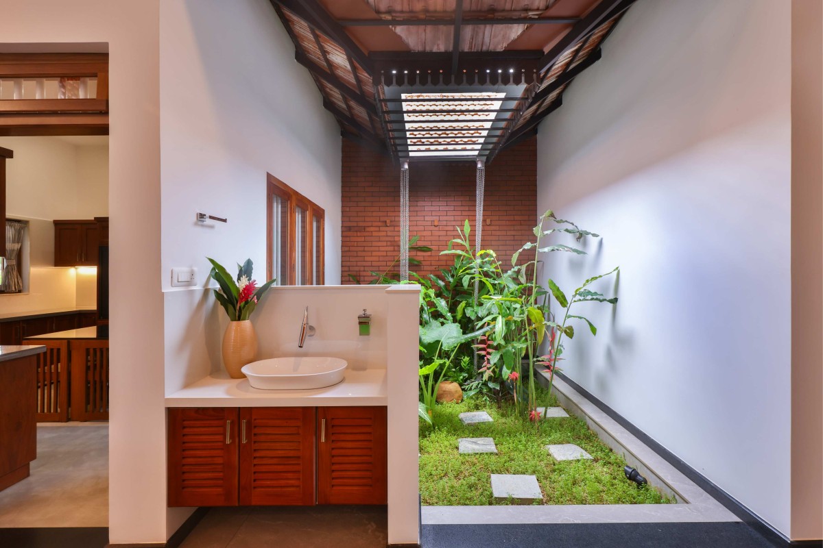 Courtyard adjacent to wash basin of Mukulika by Studio 3Twentyone