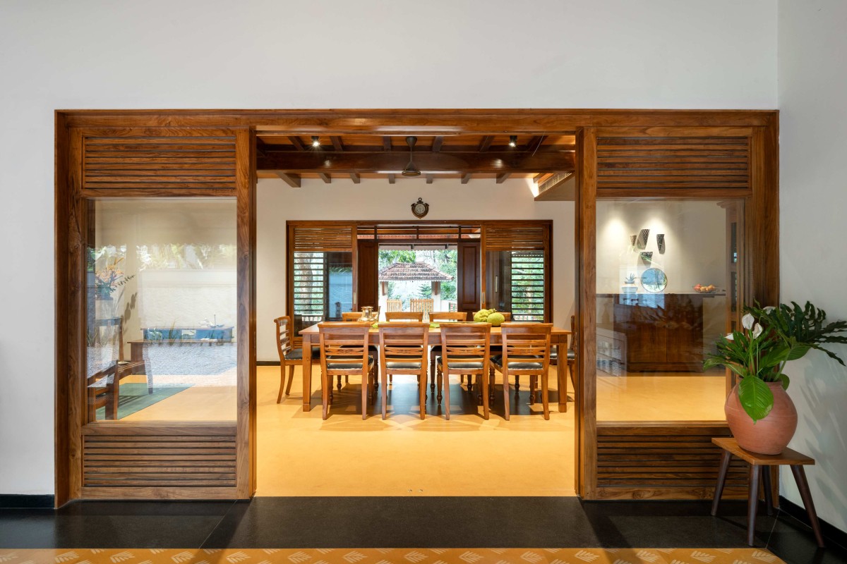 Dining view from verandah of Muttom Residence by EDOM Architecture