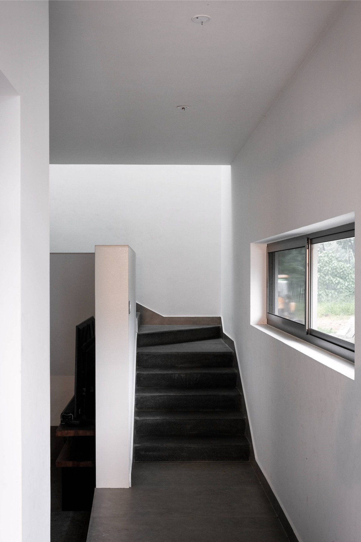 Staircase of The Monolithic House by The Design Pursuit