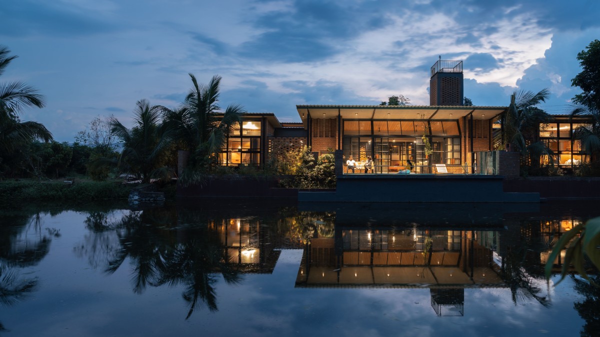 Night view of Habitat by The Lake by Studio Prakriya