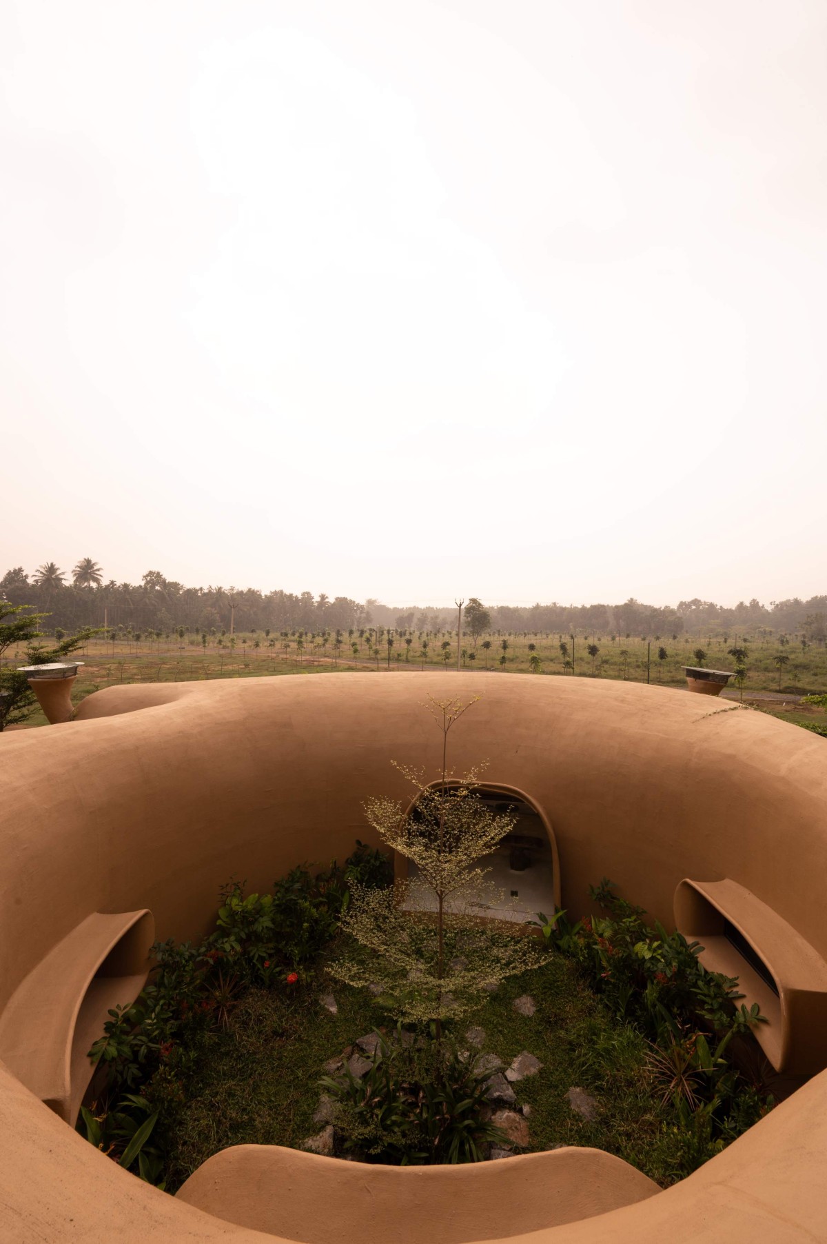 Aerial view of courtyard of Into The Wild by Earthscape Studio