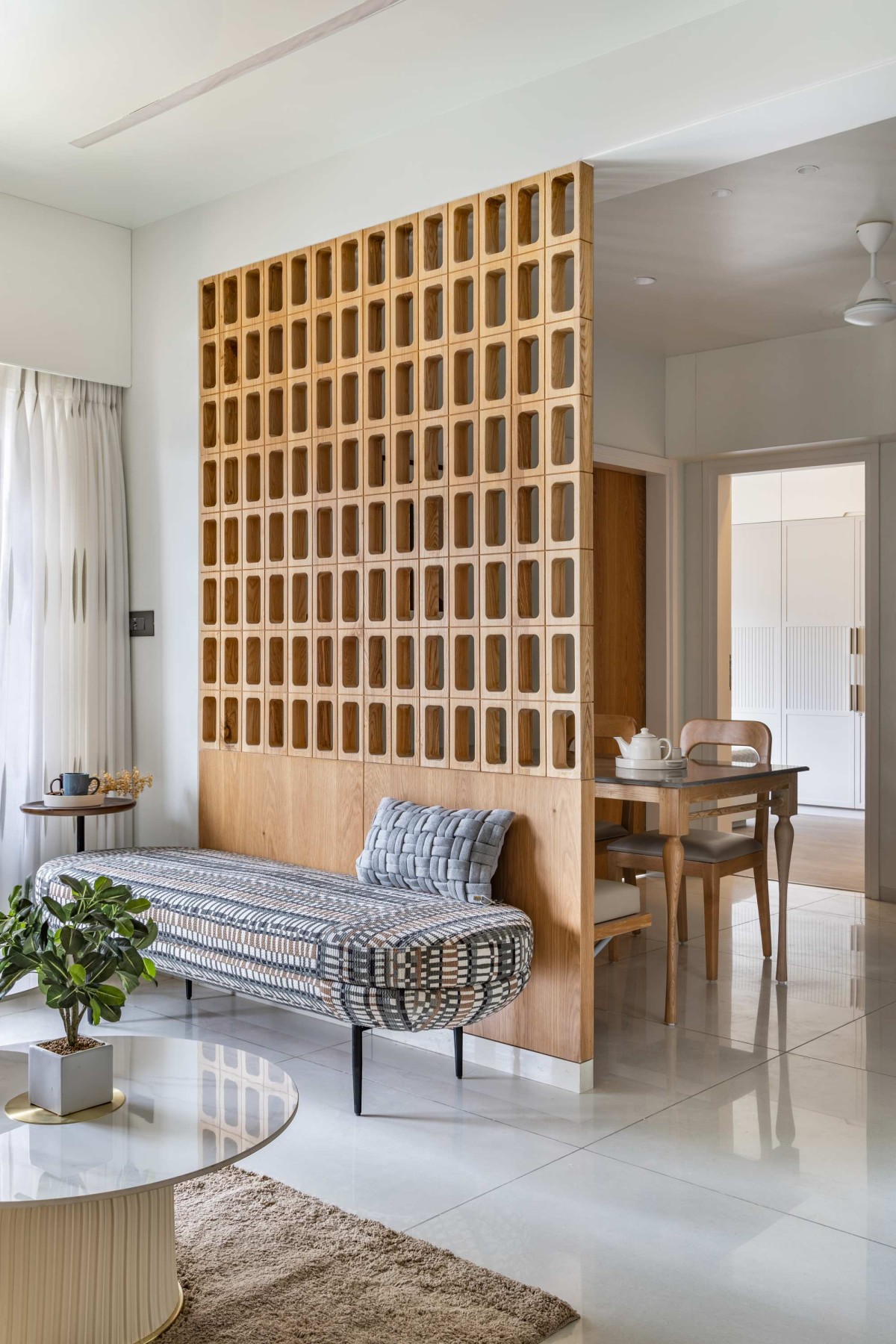 Living room of The Patel's Residence by a studio