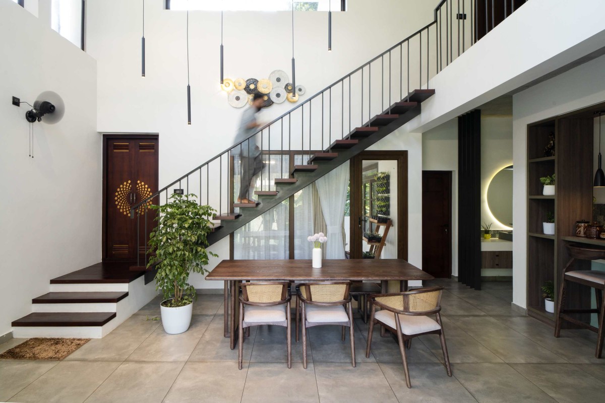 Dining & Staircase of Ikebana Residence by Mayaa Studio