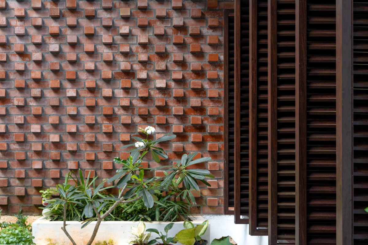 Detailed shot of brick wall of Ikebana Residence by Mayaa Studio