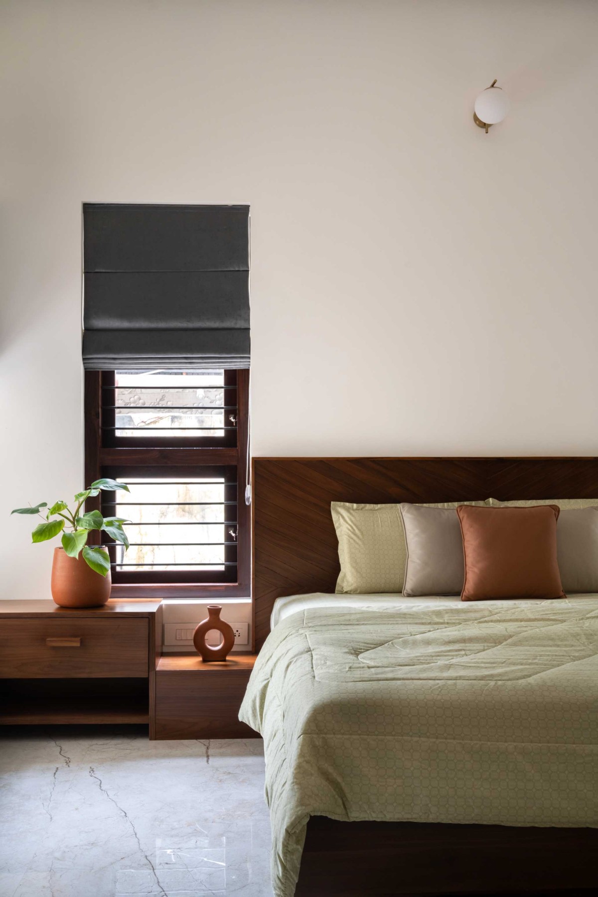 Bedroom 2 of House Beneath a Jackfruit Tree by Uru Consulting LLP