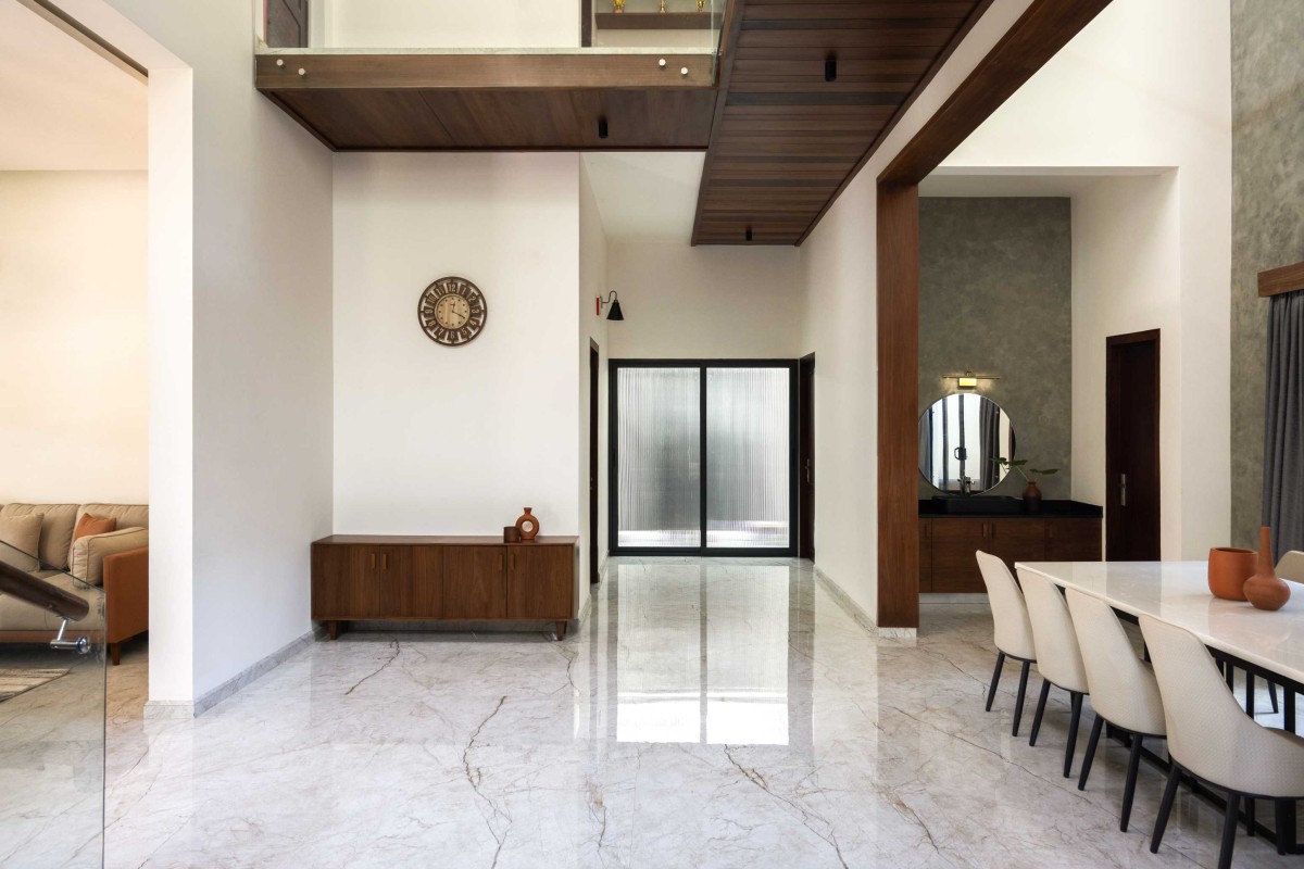 Passage to prayer room of House Beneath a Jackfruit Tree by Uru Consulting LLP