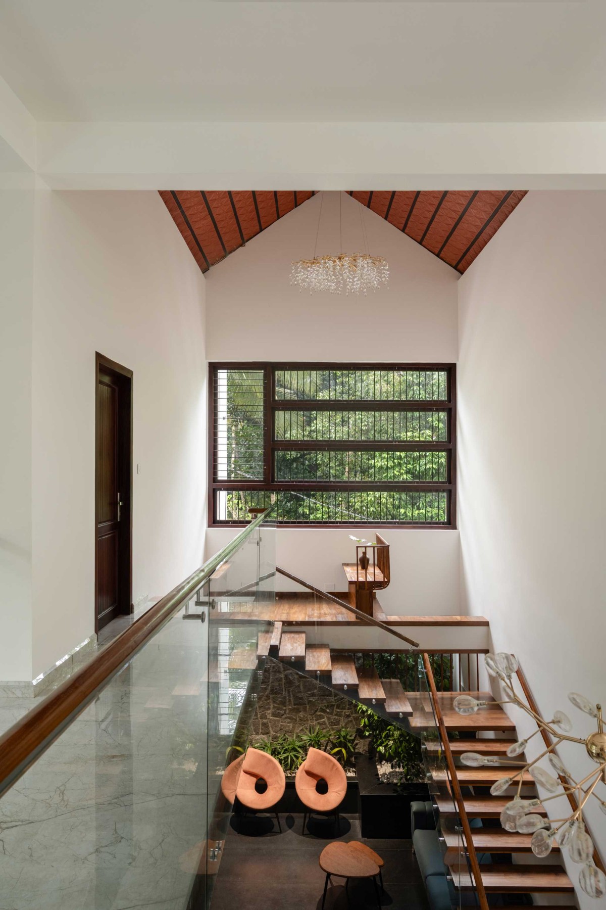 View from upper floor of House Beneath a Jackfruit Tree by Uru Consulting LLP