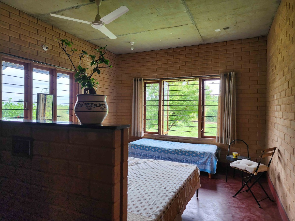 Bedroom view of Earthy House by Interface Architects Studio