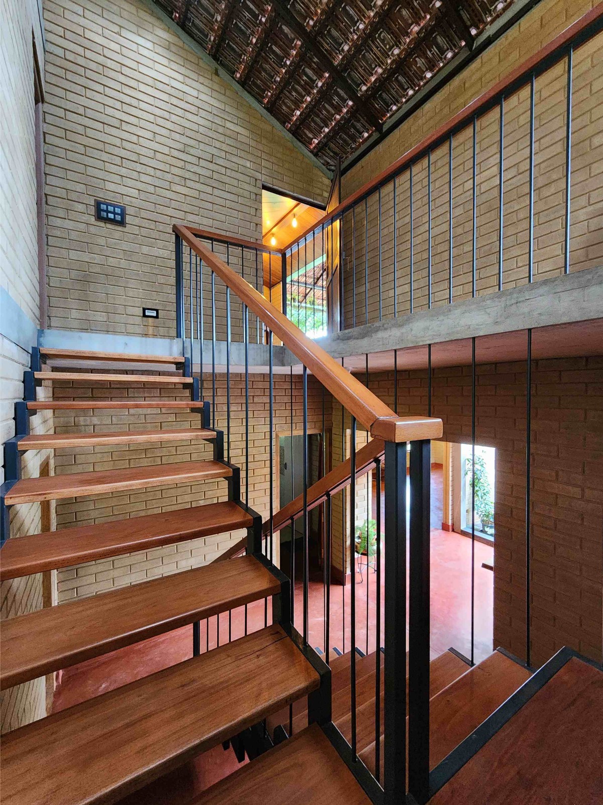 Staircase of Earthy House by Interface Architects Studio