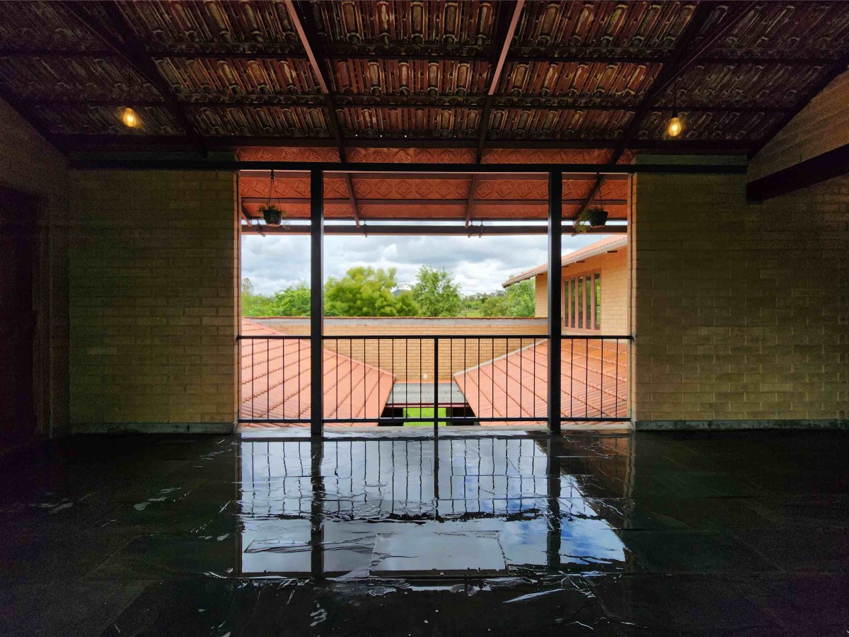 View from first floor of Earthy House by Interface Architects Studio