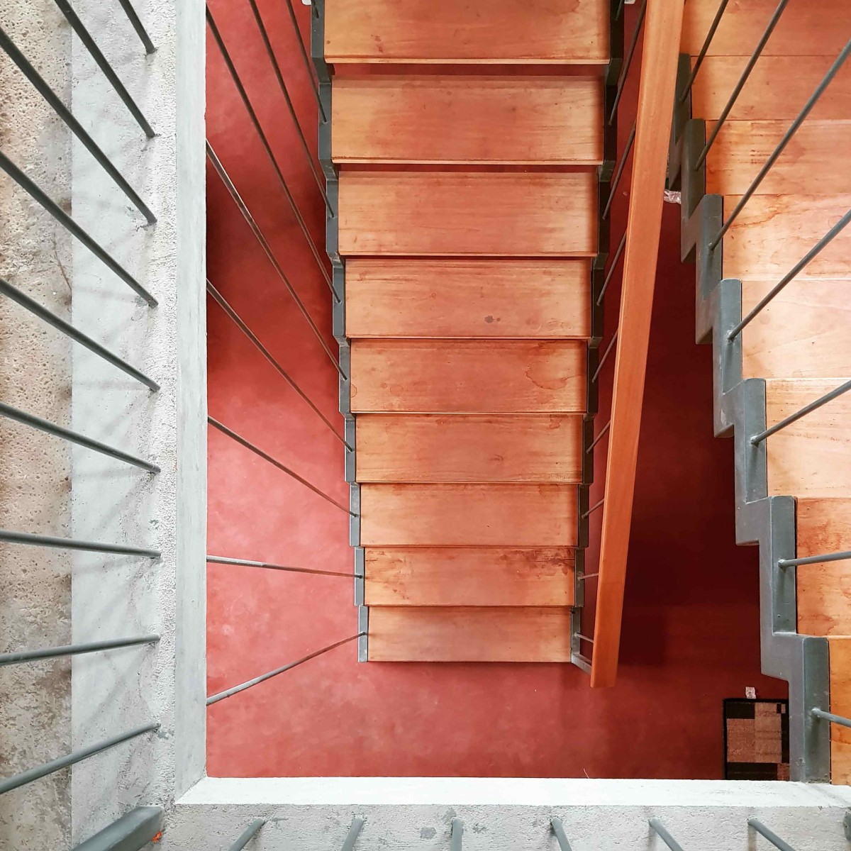 Staircase view of Earthy House by Interface Architects Studio