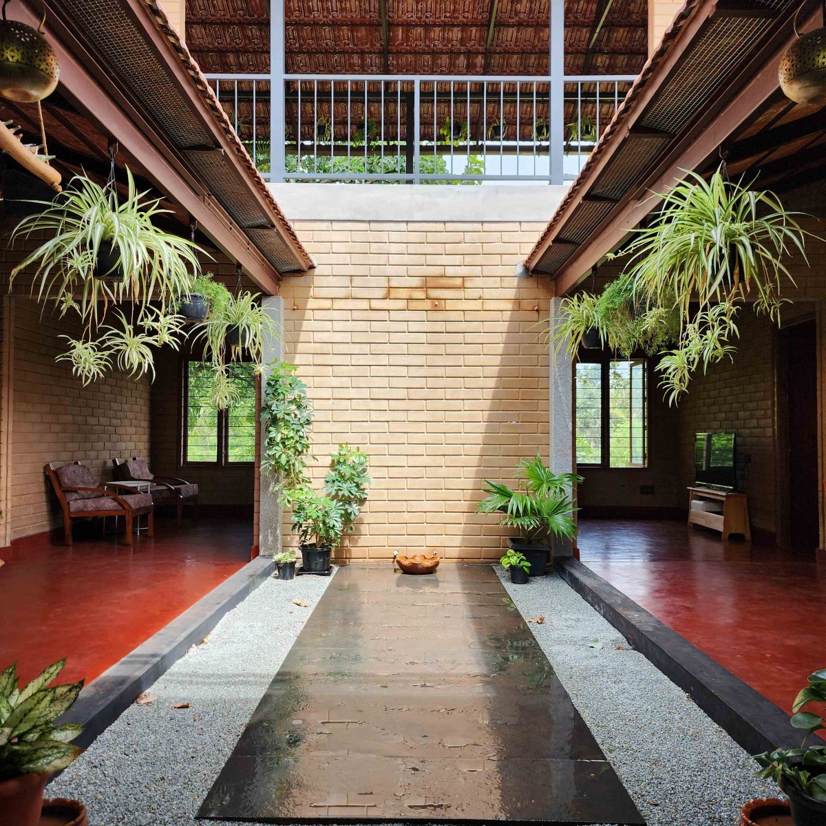 Central Courtyard of Earthy House by Interface Architects Studio