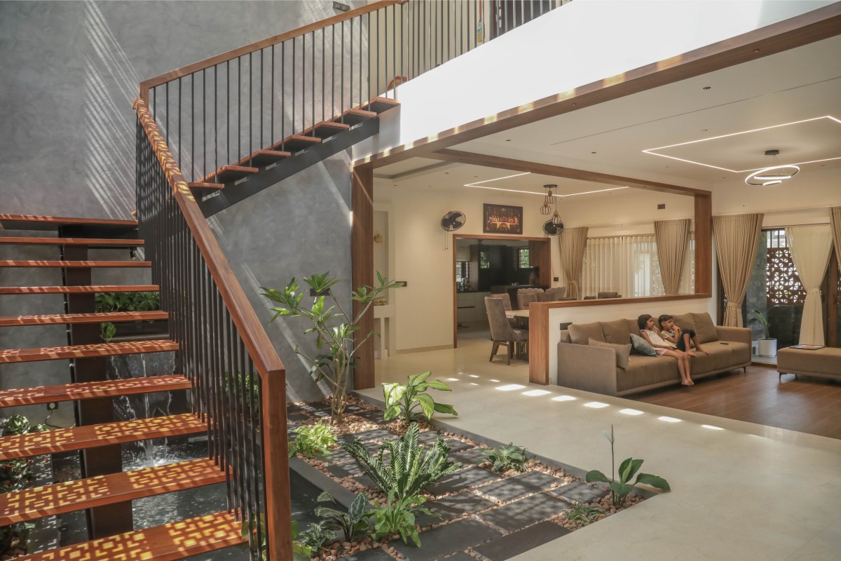 Staircase to informal living view of The Silhouette House by Hatch n’ Thatch Design Studio