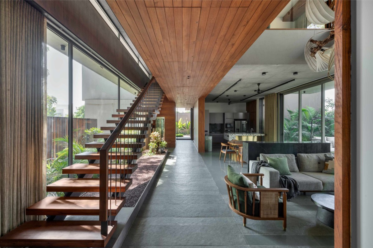 Staircase to kitchen view of The House by the Farm by Modo Designs