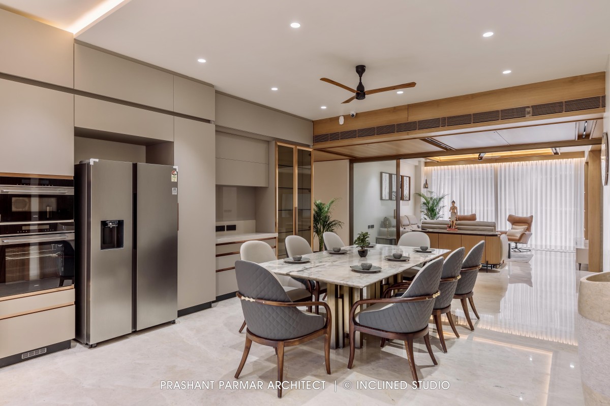 Dining of 4BHK Timeless Interiors at Skara Divyam by Prashant Parmar Architect