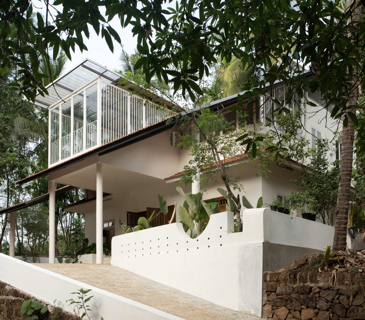 Exterior view of Kanjirakol House by Space Narratives