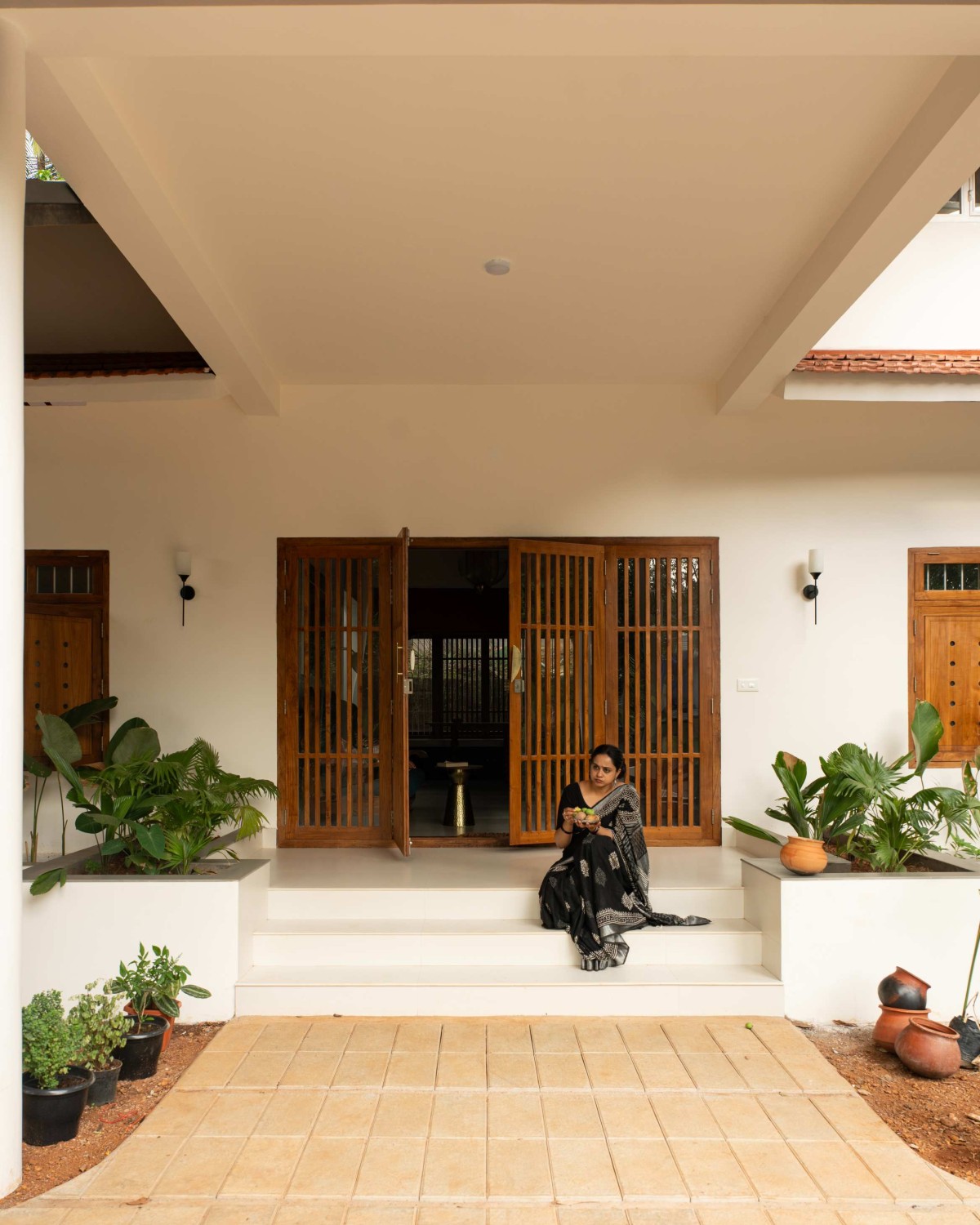 Entrance of Kanjirakol House by Space Narratives