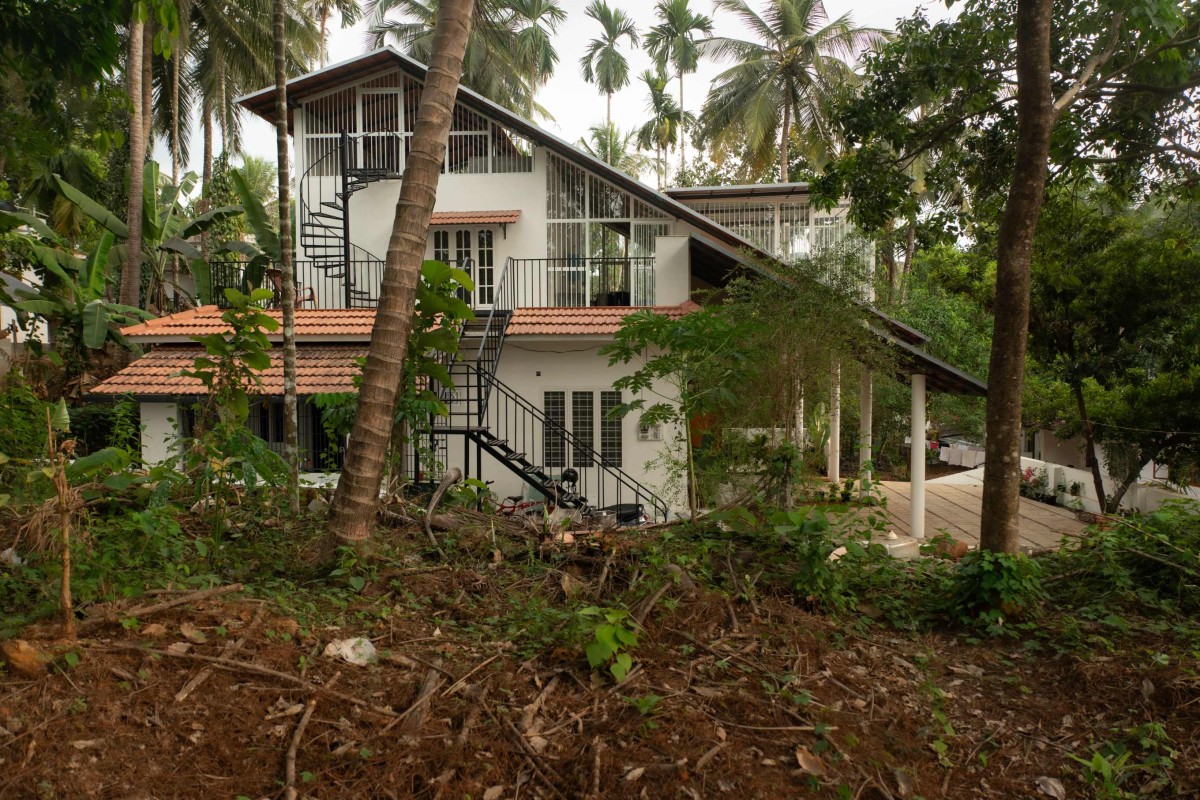 Exterior view of Kanjirakol House by Space Narratives