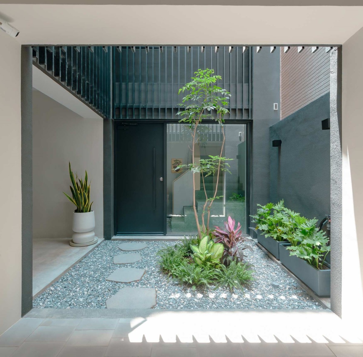 Courtyard of The Veil House by Paperfarm Inc
