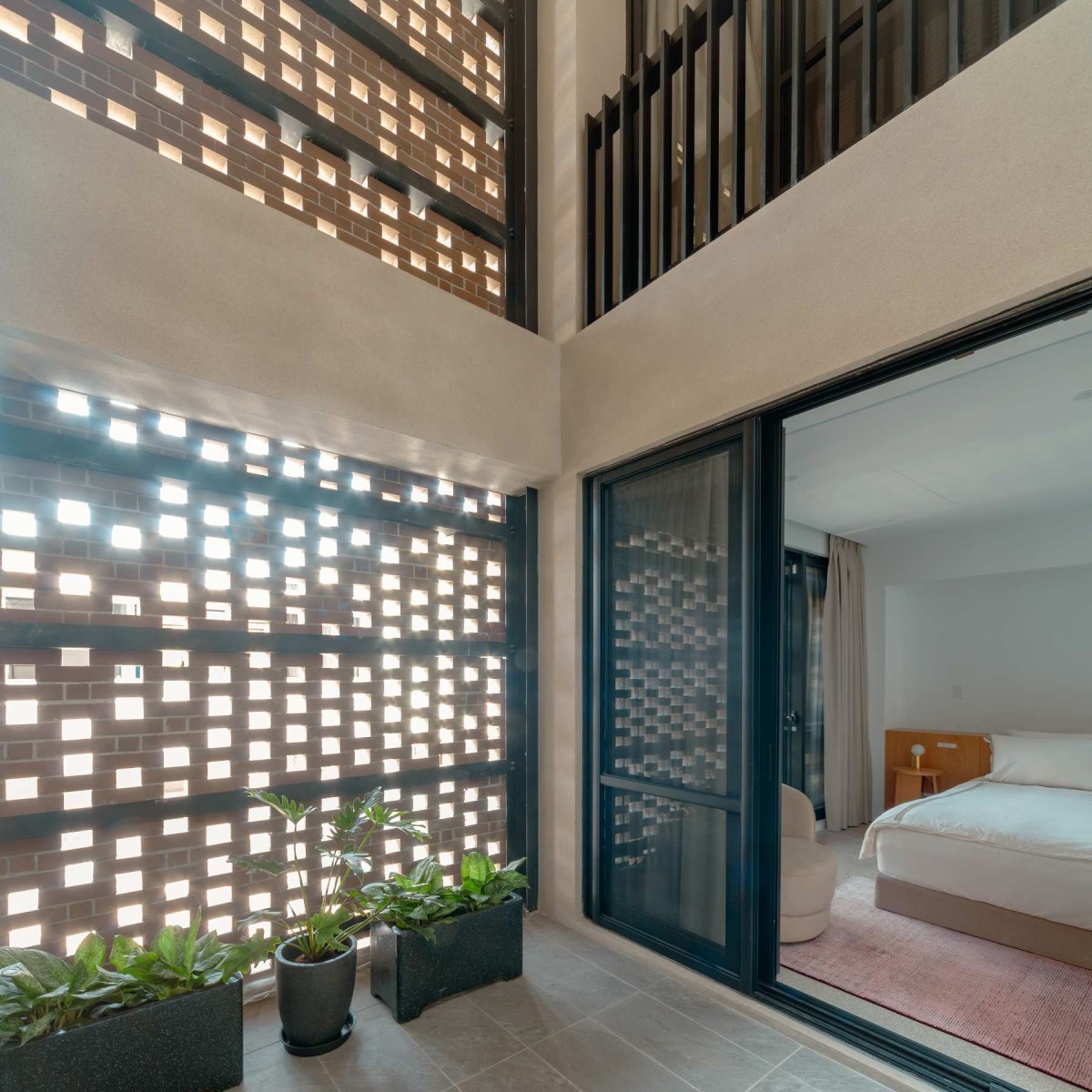 Passage to bedroom of The Veil House by Paperfarm Inc