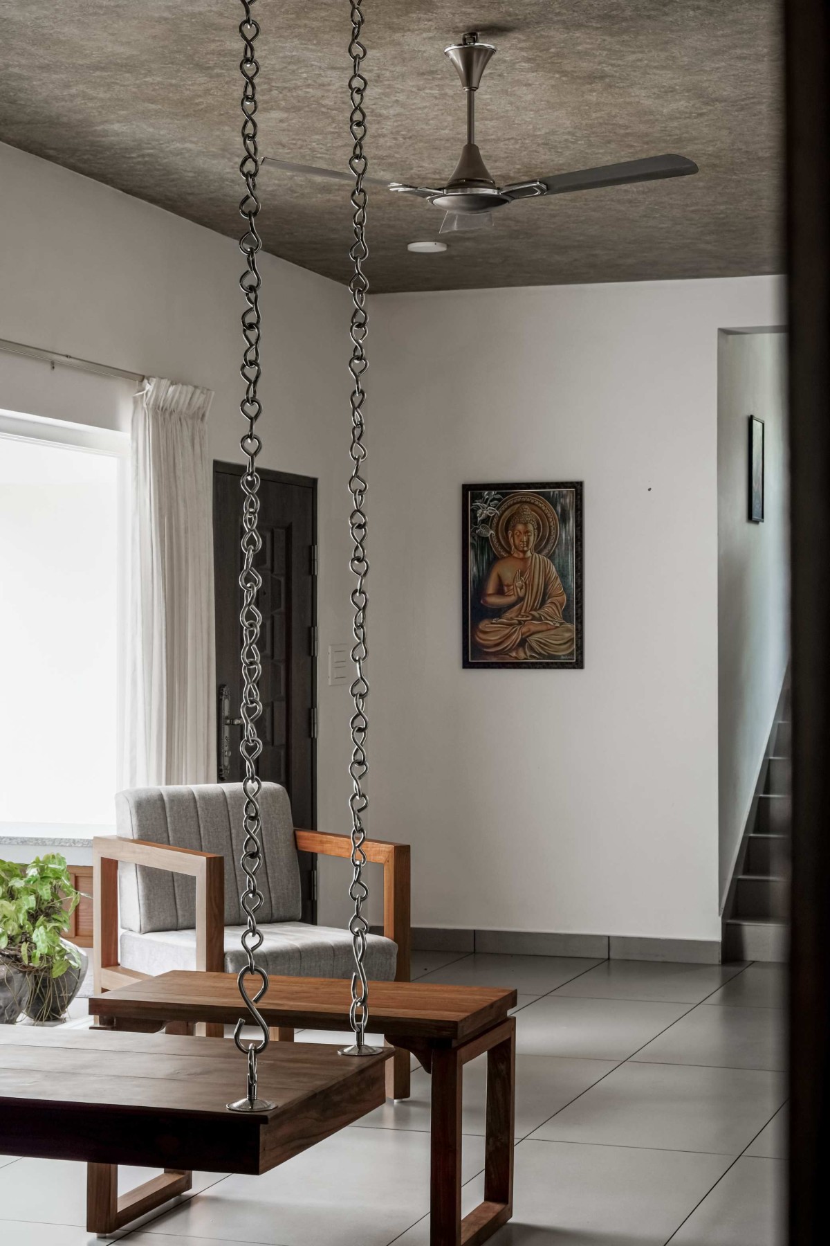 Living room of Kumaranelloor House by N&RD