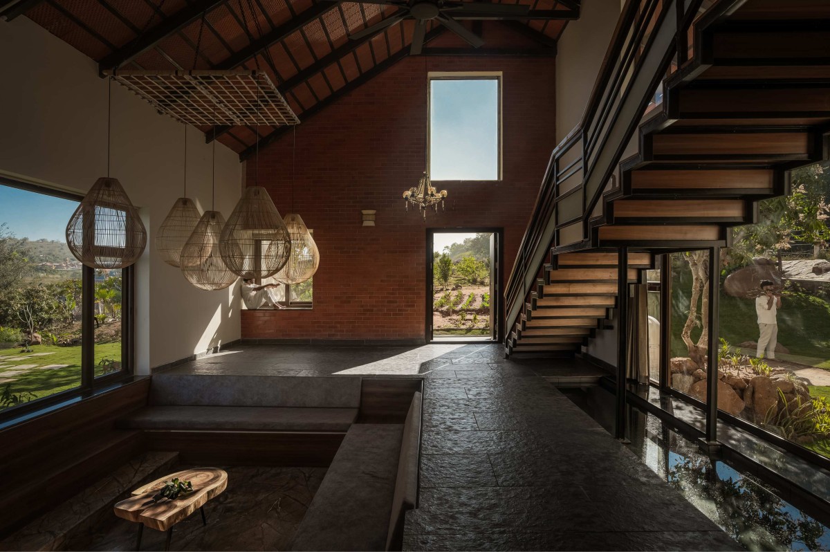 Sunken living area of Ishavas by HabitArt Architecture Studio