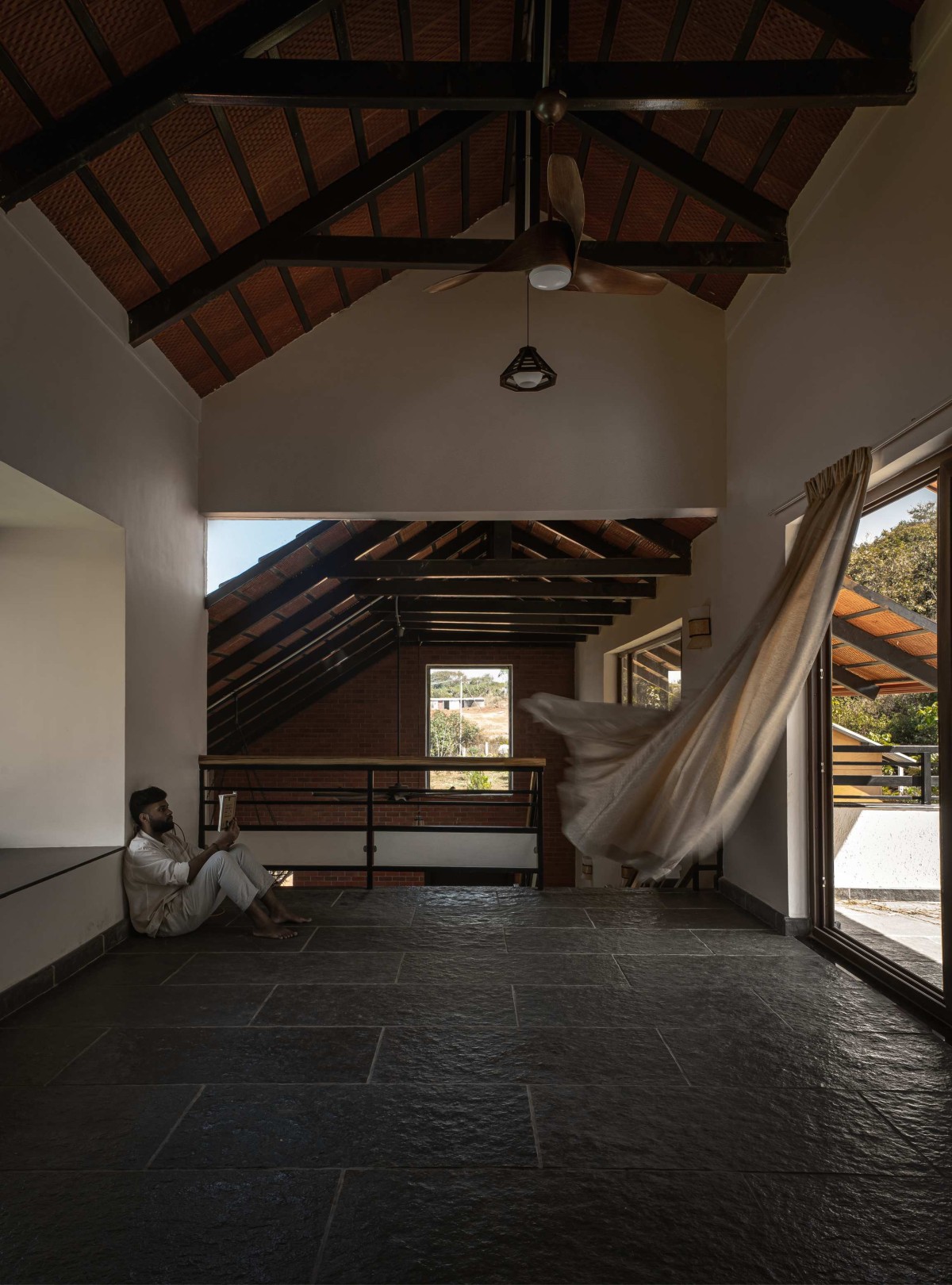 Upper living of Ishavas by HabitArt Architecture Studio