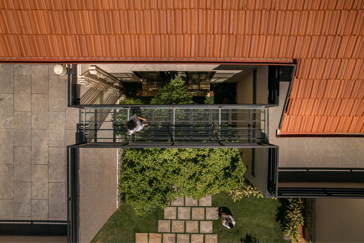 Terrace area connected with bridge of Ishavas by HabitArt Architecture Studio