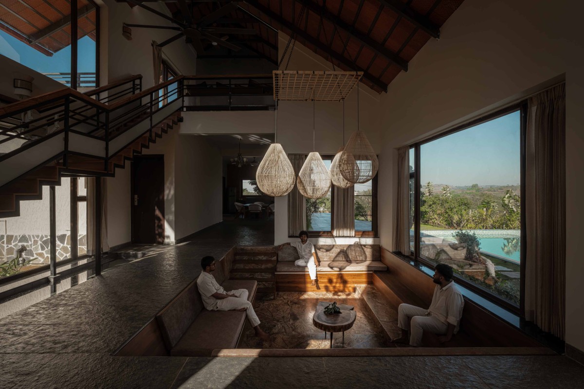 Sunken living area of Ishavas by HabitArt Architecture Studio